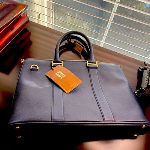 NWOT Hartmann since1877creates luxurious leather travel bags.Navy Slim Briefcase
